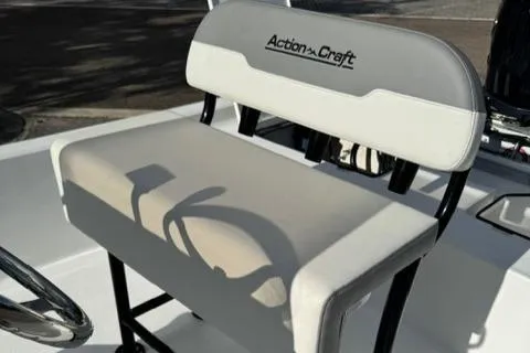 Slide: The Image of 2024 Action Craft 22 Coastal Bay boat seat with logo, white upholstery. - 21