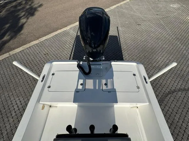 Slide: The Image of 2024 Action Craft 22 Coastal Bay boat with outboard motor, viewed from above. - 27