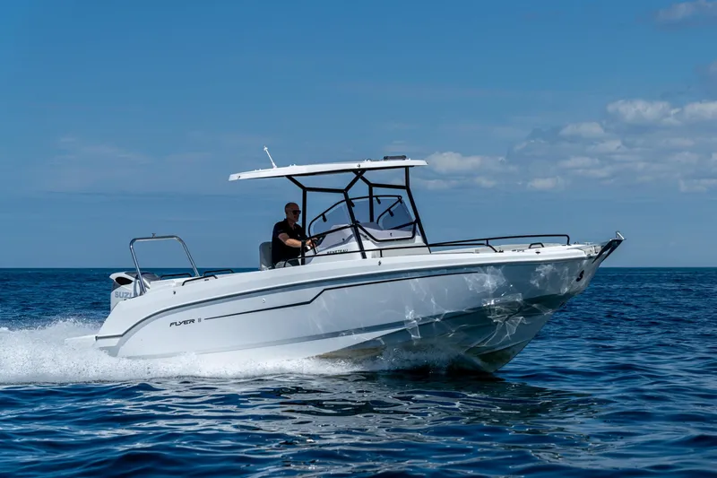 The Image of 2024 Beneteau Flyer 8 SPACEdeck cruising on open water under clear skies. - 0