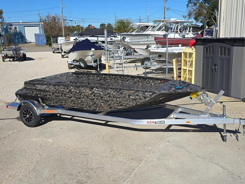 Slide: The Image of 2025 Edge Duck Boats ̃̀̉̃756DB on trailer, parked outdoors. - 2