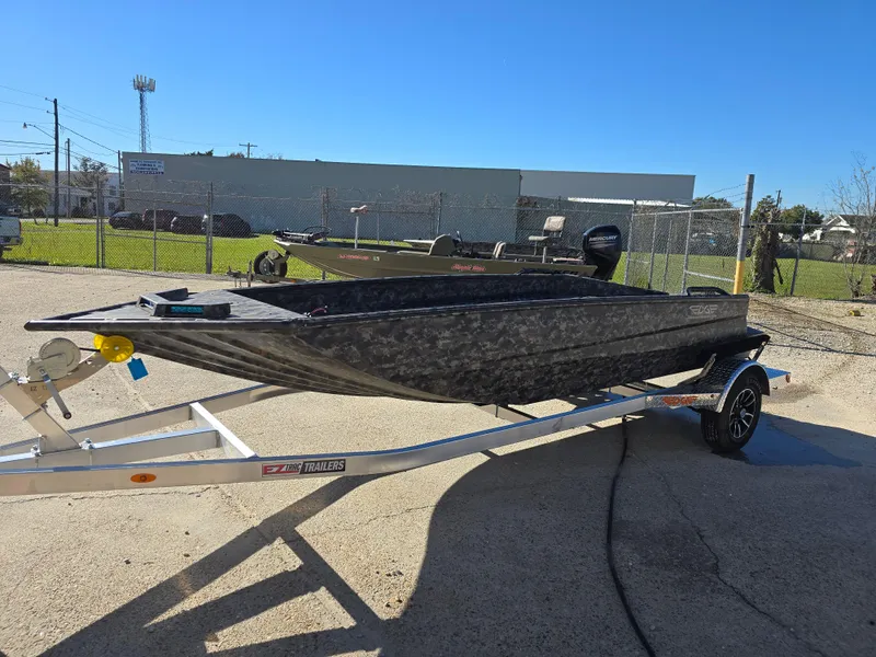 Slide: The Image of 2025 Edge Duck Boats ̃̀̉̃756DB on trailer, parked outdoors under clear blue sky. - 4