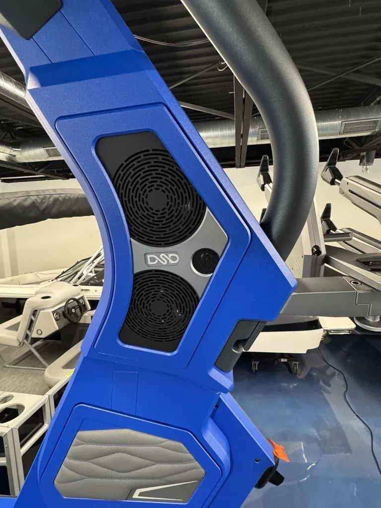 Slide: The Image of 2025 Supra SA 450 boat tower with integrated speakers in a showroom. - 14