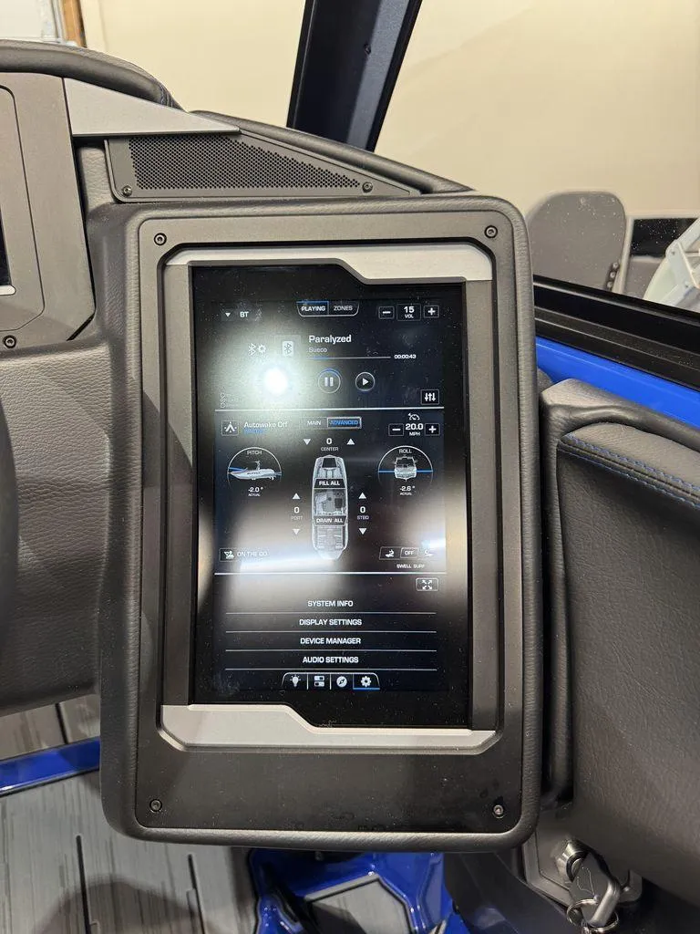 Slide: The Image of 2025 Supra SA 450 dashboard touchscreen displaying control settings and audio options. - 31