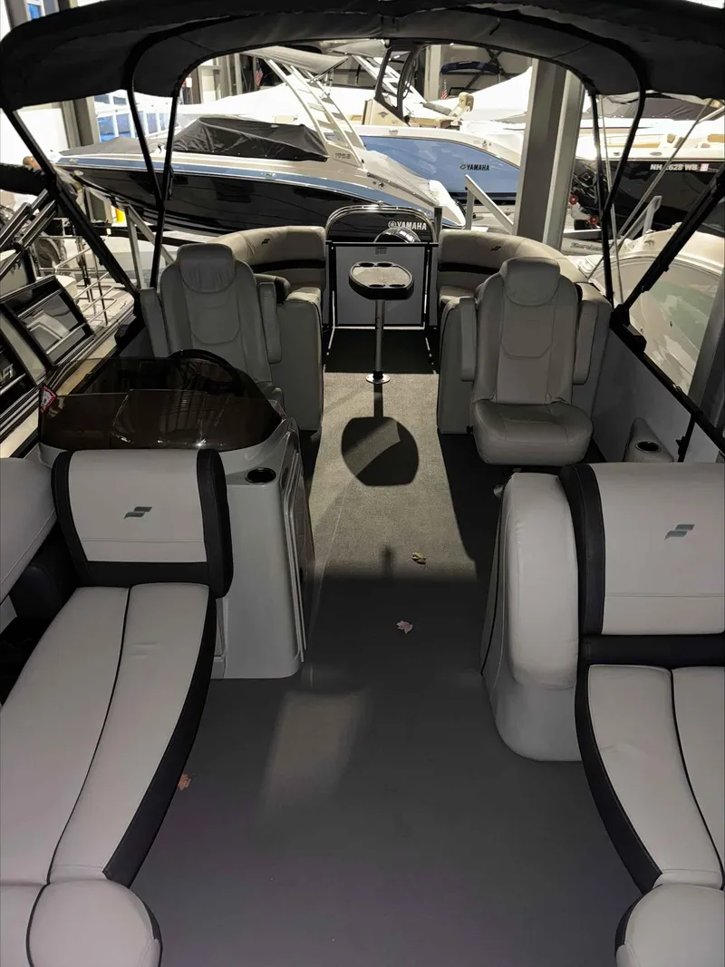 Slide: The Image of Interior of 2022 Starcraft EXS 3 boat with spacious seating and modern design. - 8
