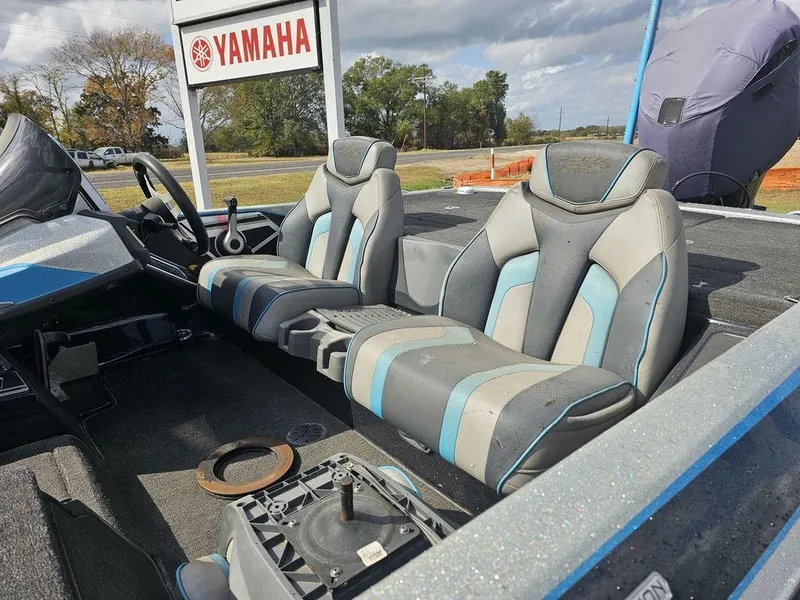 Slide: The Image of 2017 Skeeter FX20 LE boat interior with Yamaha sign in background. - 2