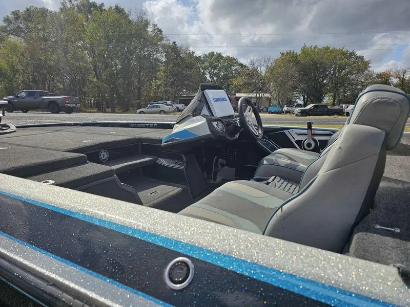 Slide: The Image of 2017 Skeeter FX20 LE bass boat interior with steering console and seating. - 5