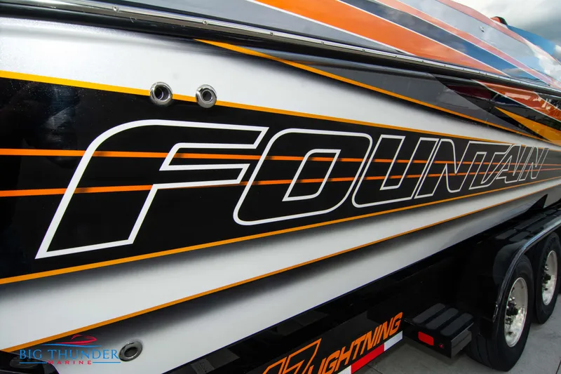 Slide: The Image of 2020 Fountain 47 Lightning boat with bold graphics and sleek design. - 12