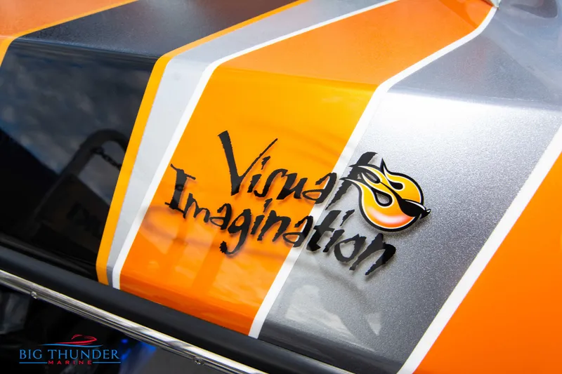 Slide: The Image of Fountain 47 Lightning 2020 boat with vibrant orange and gray design, "Visual Imagination" logo. - 13