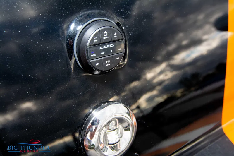Slide: The Image of Close-up of JL Audio control panel on 2020 Fountain 47 Lightning boat. - 16