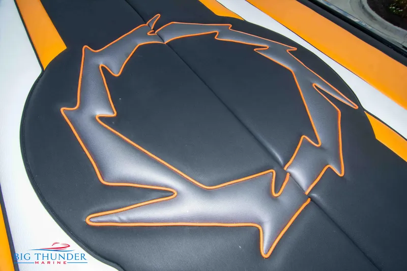 Slide: The Image of 2020 Fountain 47 Lightning boat upholstery with orange and black design. - 18