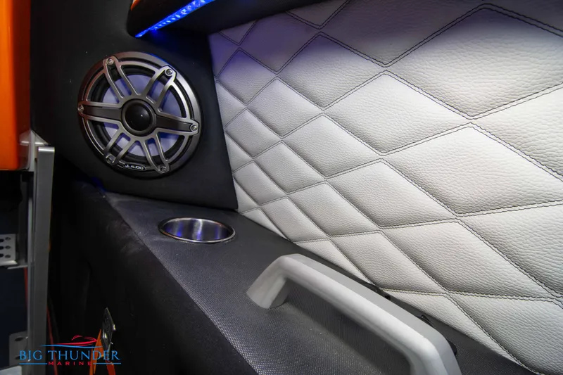 Slide: The Image of 2020 Fountain 47 Lightning interior with speaker, quilted leather, and cup holder. - 23