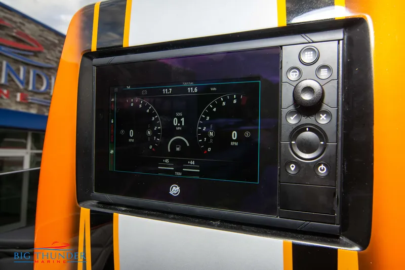 Slide: The Image of Dashboard of a 2020 Fountain 47 Lightning boat with digital display and controls. - 31