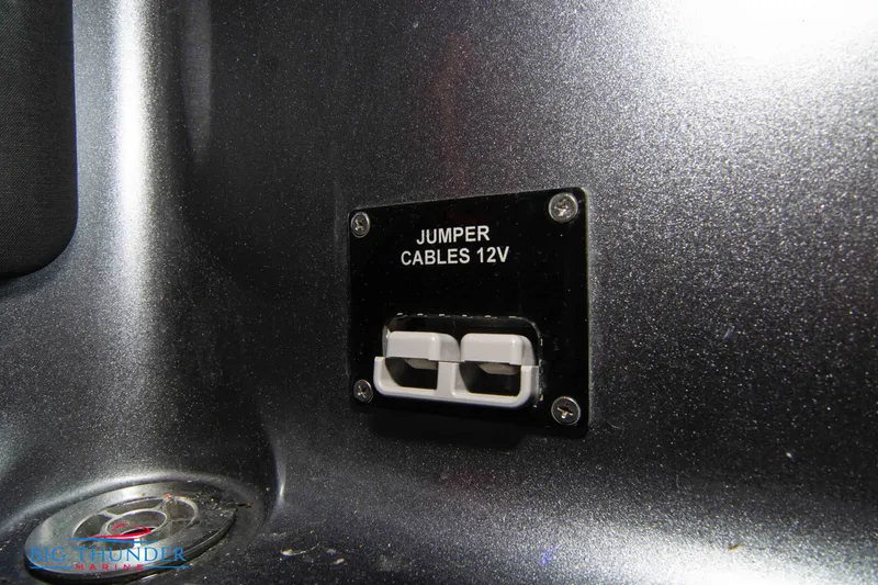Slide: The Image of 12V jumper cable port on 2020 Fountain 47 Lightning boat. - 33