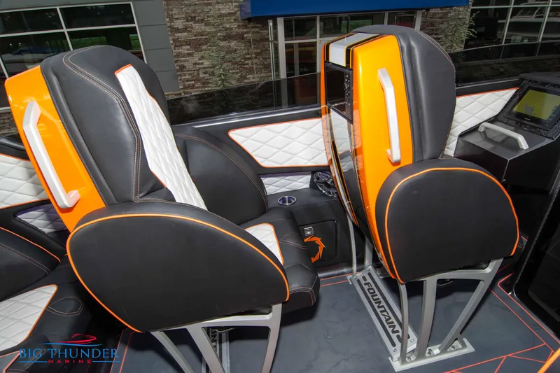 Slide: The Image of 2020 Fountain 47 Lightning boat interior with orange and black seats, modern design. - 37