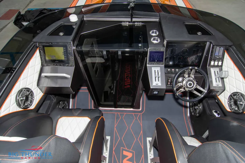 Slide: The Image of 2020 Fountain 47 Lightning boat cockpit with modern controls and luxury seating. - 39