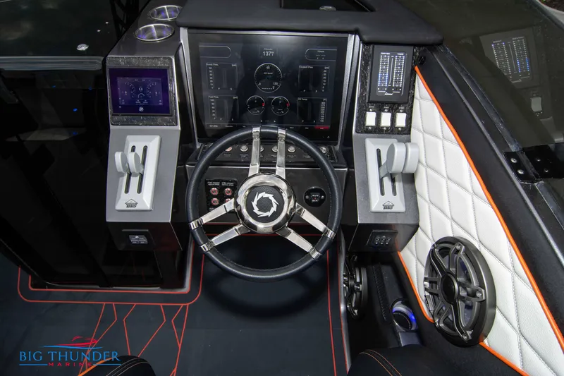 Slide: The Image of Cockpit of 2020 Fountain 47 Lightning boat with modern controls and steering wheel. - 41