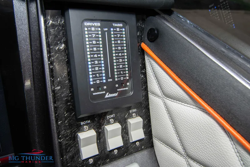 Slide: The Image of Control panel of a 2020 Fountain 47 Lightning boat with switches and indicators. - 46