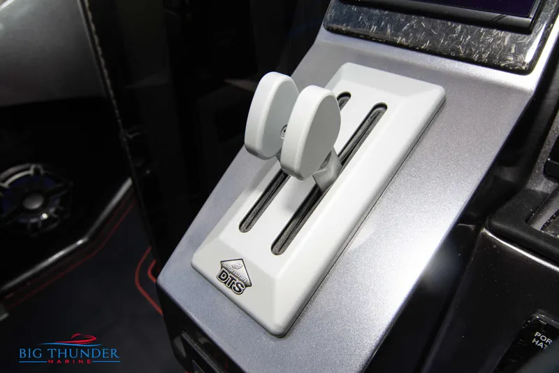 Slide: The Image of Throttle controls of a 2020 Fountain 47 Lightning boat. - 48