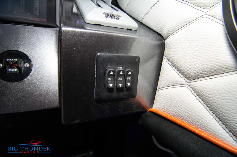 Slide: The Image of Control panel in a 2020 Fountain 47 Lightning boat interior. - 49