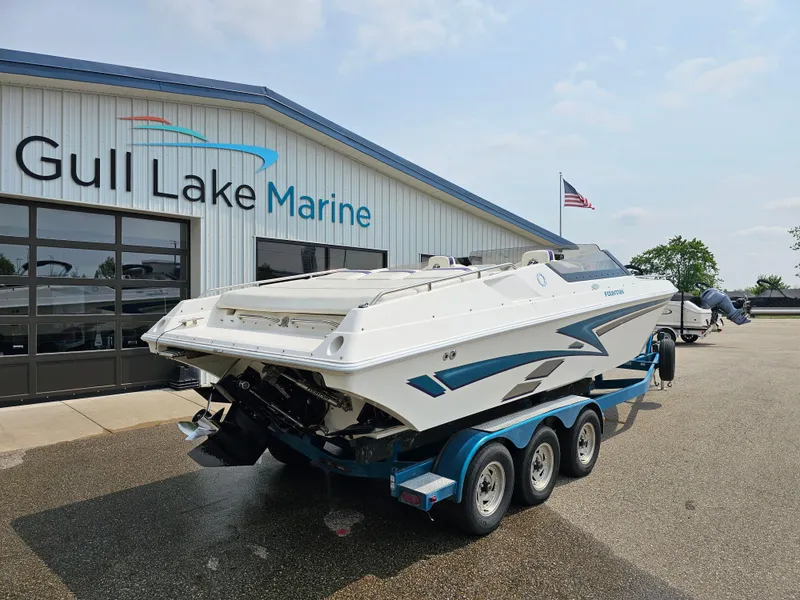 Slide: The Image of 1999 Fountain 29 Fever boat on trailer at Gull Lake Marine dealership. - 2