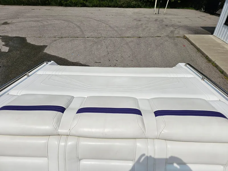 Slide: The Image of White leather seating on 1999 Fountain 29 Fever boat, outdoor setting. - 7