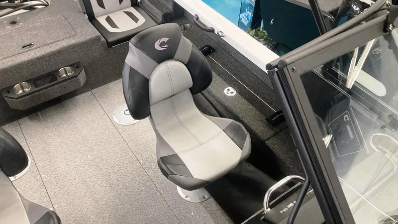 Slide: The Image of 2025 Crestliner 1850 Fish Hawk WT JS boat interior with sleek seating and modern design. - 6