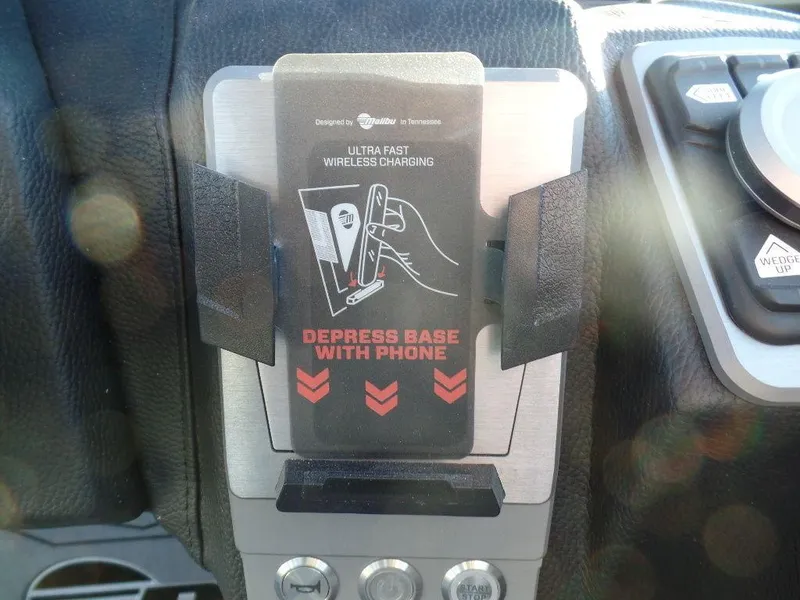 Slide: The Image of Ultra-fast wireless charging station in 2025 Malibu 25 LSV boat dashboard. - 15