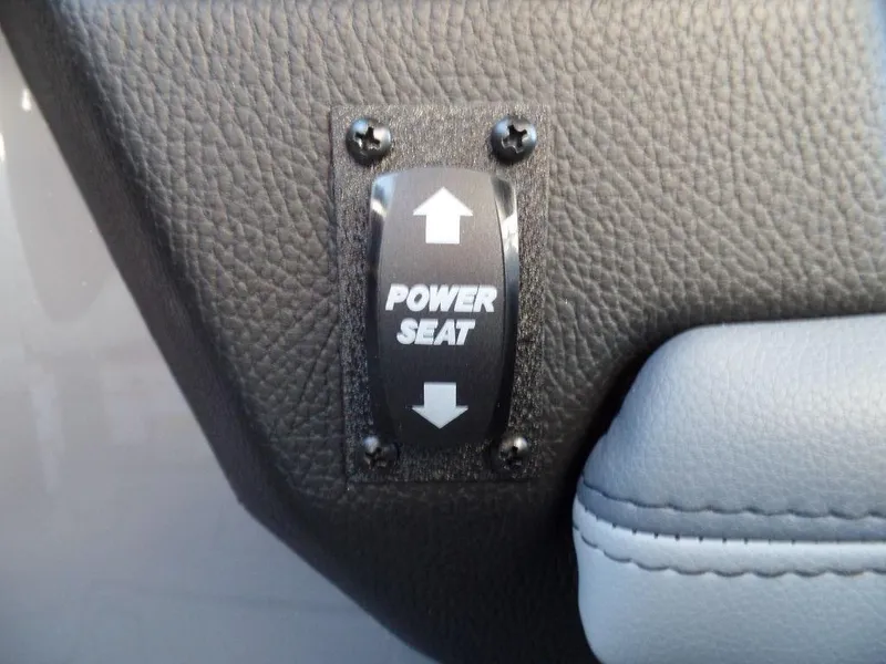 Slide: The Image of 2025 Malibu 25 LSV power seat control switch on leather interior. - 16