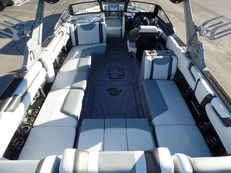 Slide: The Image of 2025 Malibu 25 LSV boat interior with spacious seating and modern design. - 4