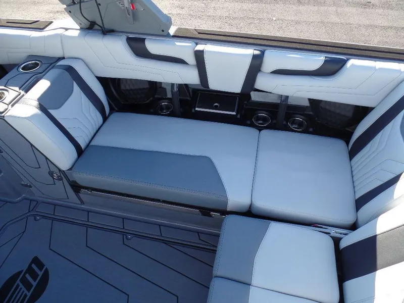 Slide: The Image of 2025 Malibu 25 LSV boat interior with sleek, modern seating and stylish upholstery. - 6
