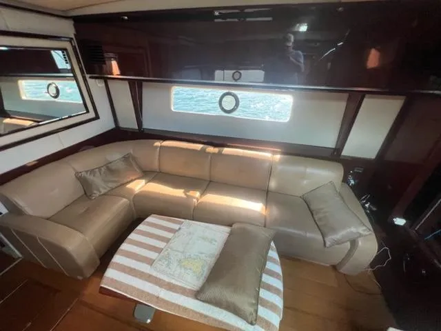 Slide: The Image of Luxurious interior of 2012 Sea Ray 500 Sundancer yacht with leather seating and elegant decor. - 17
