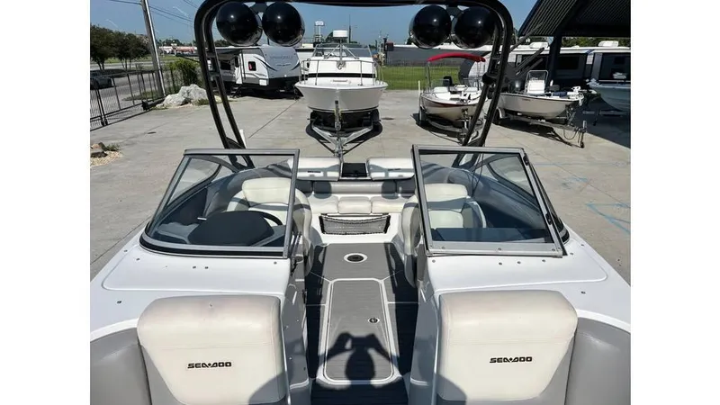 Slide: The Image of 2012 Sea-Doo 230 Challenger SE boat interior with dual windshields and seating. - 12