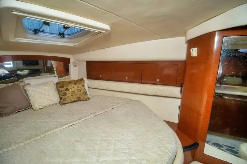 Slide: The Image of Luxurious cabin interior of 2005 Sea Ray 340 Sundancer yacht. - 11