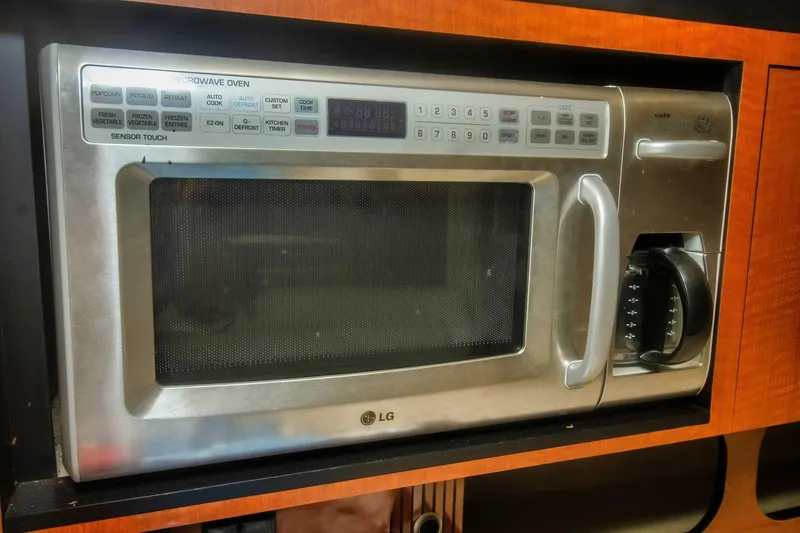 Slide: The Image of LG microwave oven in a 2005 Sea Ray 340 Sundancer yacht kitchen. - 15