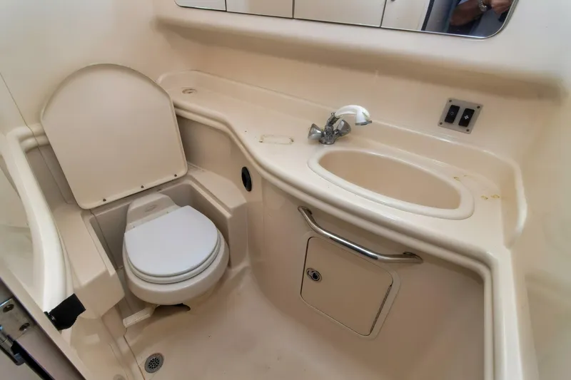 Slide: The Image of 2005 Sea Ray 340 Sundancer bathroom with sink and toilet. - 16