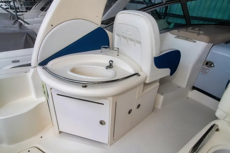 Slide: The Image of 2005 Sea Ray 340 Sundancer boat interior with sink and seating area. - 7