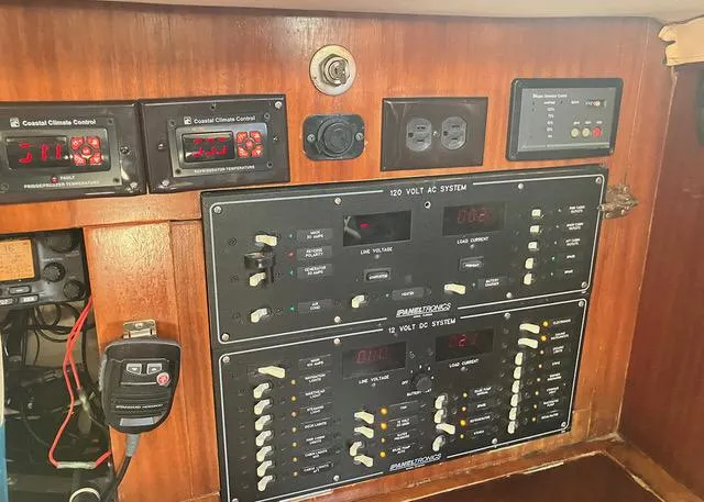 Slide: The Image of Electrical control panel on a 1990 Beneteau Sloop sailboat. - 18