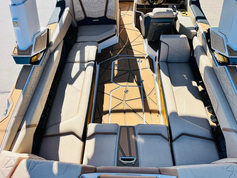 Slide: The Image of Luxurious interior of 2025 Nautique Super Air Nautique G25 Paragon boat. - 13