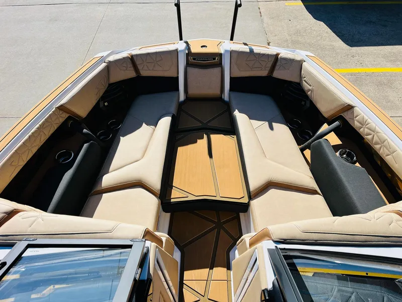 Slide: The Image of 2025 Nautique Super Air Nautique G25 Paragon interior with luxurious seating and modern design. - 14