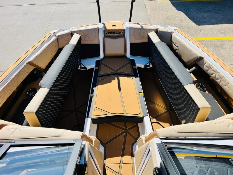 Slide: The Image of 2025 Nautique Super Air Nautique G25 Paragon interior with luxurious seating and modern design. - 15