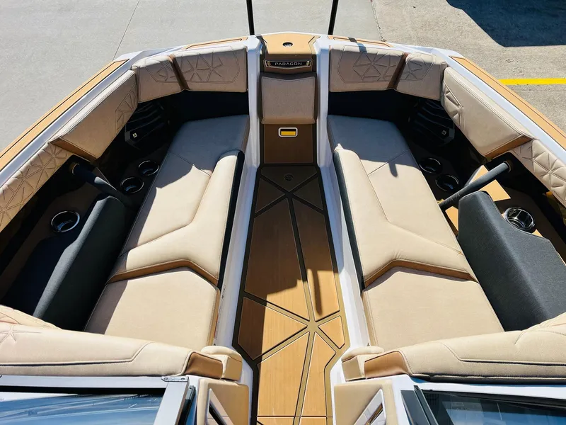 Slide: The Image of 2025 Nautique Super Air Nautique G25 Paragon interior with luxurious seating and modern design. - 18