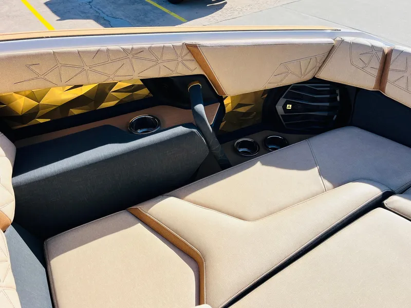 Slide: The Image of 2025 Nautique Super Air Nautique G25 Paragon interior with luxurious seating and modern design. - 26