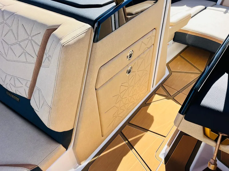 Slide: The Image of Luxurious interior of 2025 Nautique Super Air Nautique G25 Paragon boat. - 30