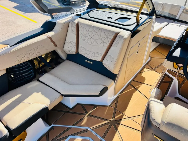 Slide: The Image of Luxurious interior of 2025 Nautique Super Air Nautique G25 Paragon boat. - 37