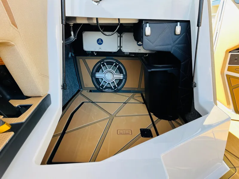 Slide: The Image of 2025 Nautique Super Air Nautique G25 Paragon interior with premium sound system. - 39