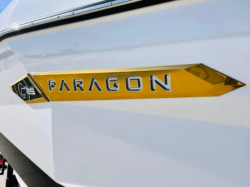 Slide: The Image of 2025 Nautique Super Air Nautique G25 Paragon logo on boat hull. - 4