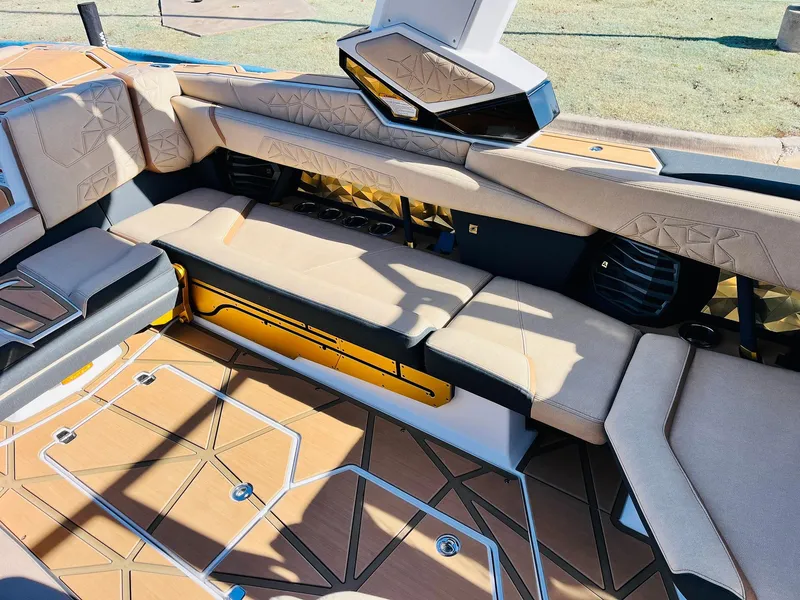Slide: The Image of 2025 Nautique Super Air Nautique G25 Paragon interior with luxurious seating and modern design. - 40