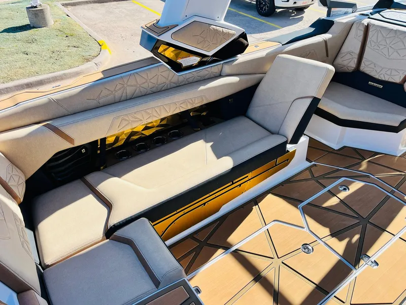 Slide: The Image of 2025 Nautique Super Air Nautique G25 Paragon interior with luxurious seating and modern design. - 42