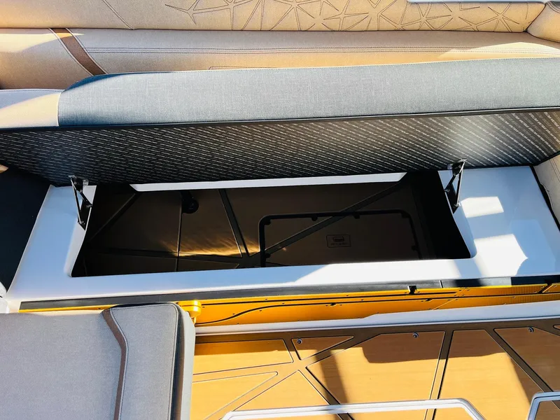 Slide: The Image of 2025 Nautique Super Air Nautique G25 Paragon interior storage compartment. - 45
