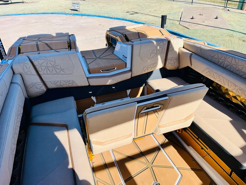 Slide: The Image of 2025 Nautique Super Air Nautique G25 Paragon interior with luxurious seating and modern design. - 49